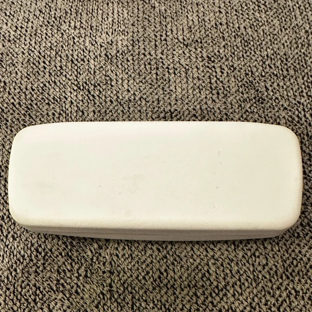 Calvin Klein youth eyeglasses and case.